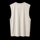 Camiseta sin mangas color hueso (beige), 100% algodón. Oversized. Vista por la parte de detrás. La parte trasera está completamente lisa.